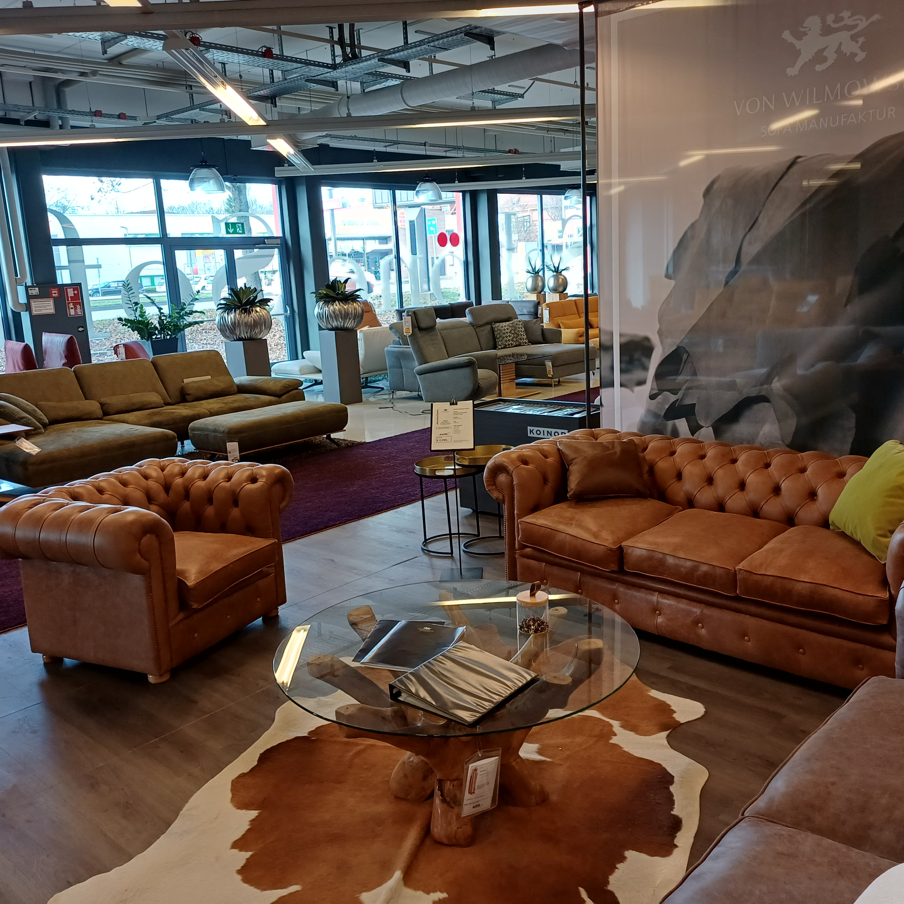 Chesterfield Sofa 3,5-Sitzer mit Sessel in Leder Chesterfield Sofa 3,5-Sitzer mit Sessel in Leder