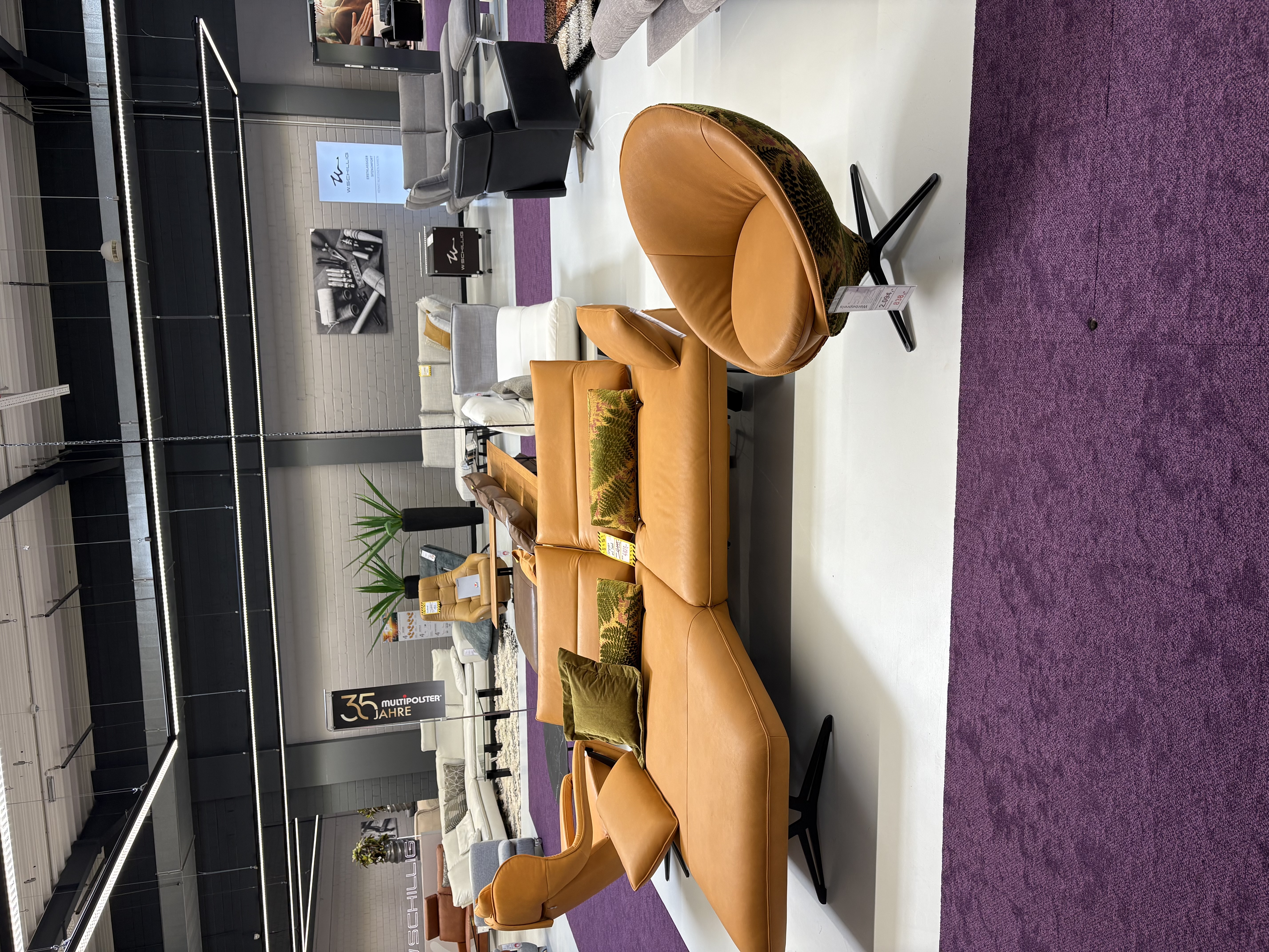 Ecksofa Caio in leder curry und Sessel Impuls